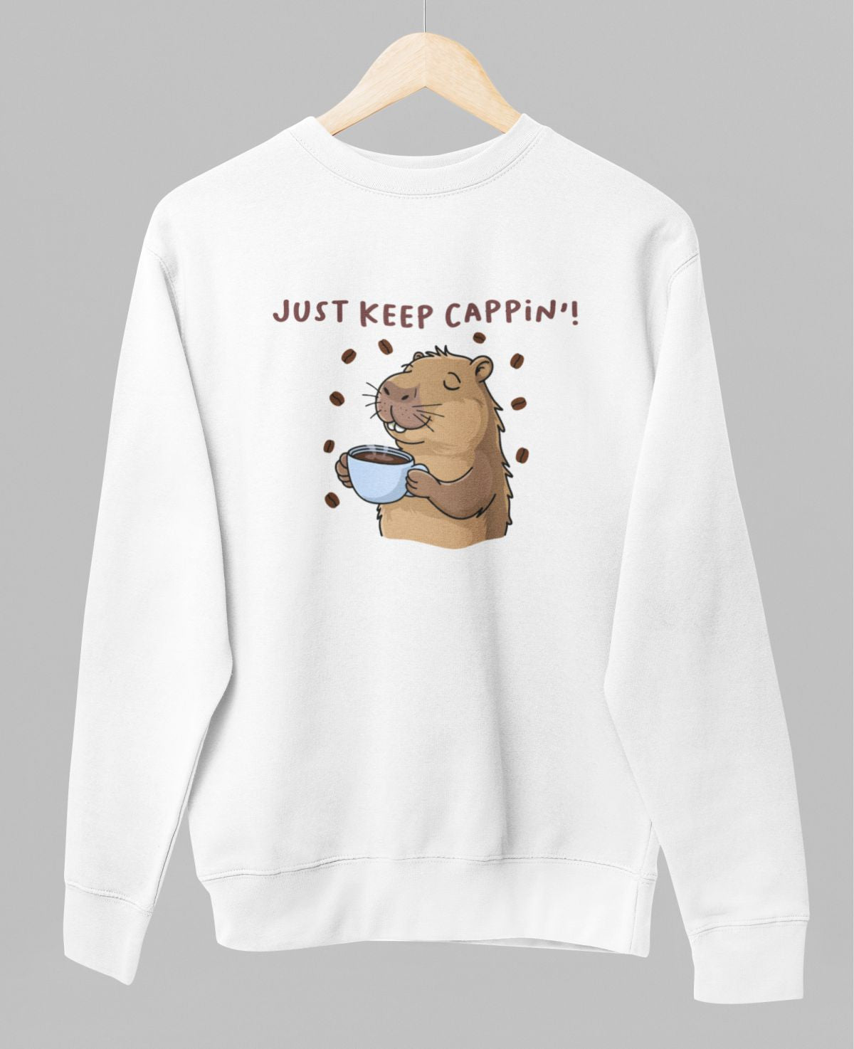 Baltas UNISEX džemperis be gobtuvo "Just keep cappin'"
