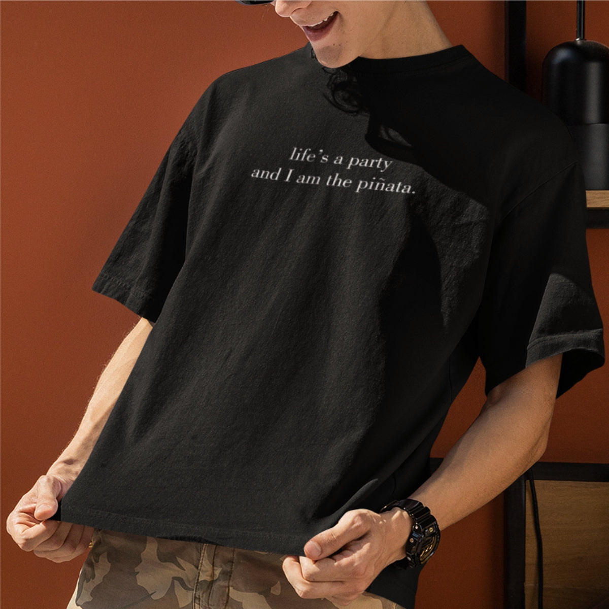 Juodi UNISEX OVERSIZED marškinėliai "Life's a party"