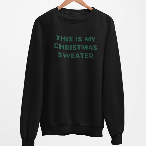 Juodas džemperis be gobtuvo "This is my Christmas sweater"